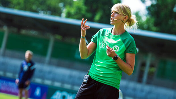 Eine Trainerin des VfL Wolfsburg beim Trainerkongress.