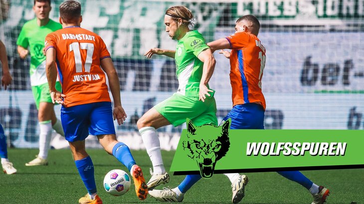 VfL-Wolfsburg-Spieler Lovro Majer im Kampf um den Ball mit dem Gegenspielern.