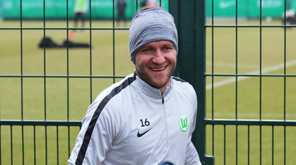 Jakub Blaszczykowski lächelt bei der Trainingseinheit. 