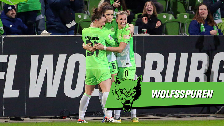 Die VfL-Wolfsburg-Spielerinnen jubeln zusammen.