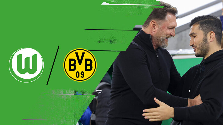 Pressekonferenz nach dem 1:0-Heimsieg gegen den BVB. VfL-Wolfsburg-Trainer Ralph Hasenhüttl und Nuri Sahin nehmen sich in den Arm und lachen.