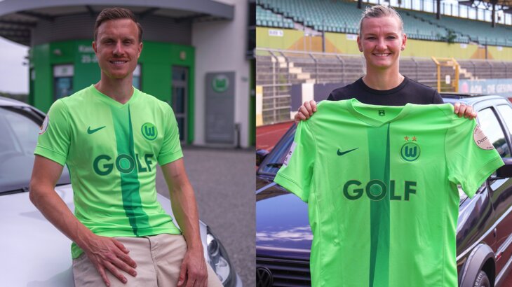 Die VfL-Wolfsburg-Spieler Yannick Gerhardt und Alexandra Popp posieren mit dem neuen Sondertrikot der Wölfe.