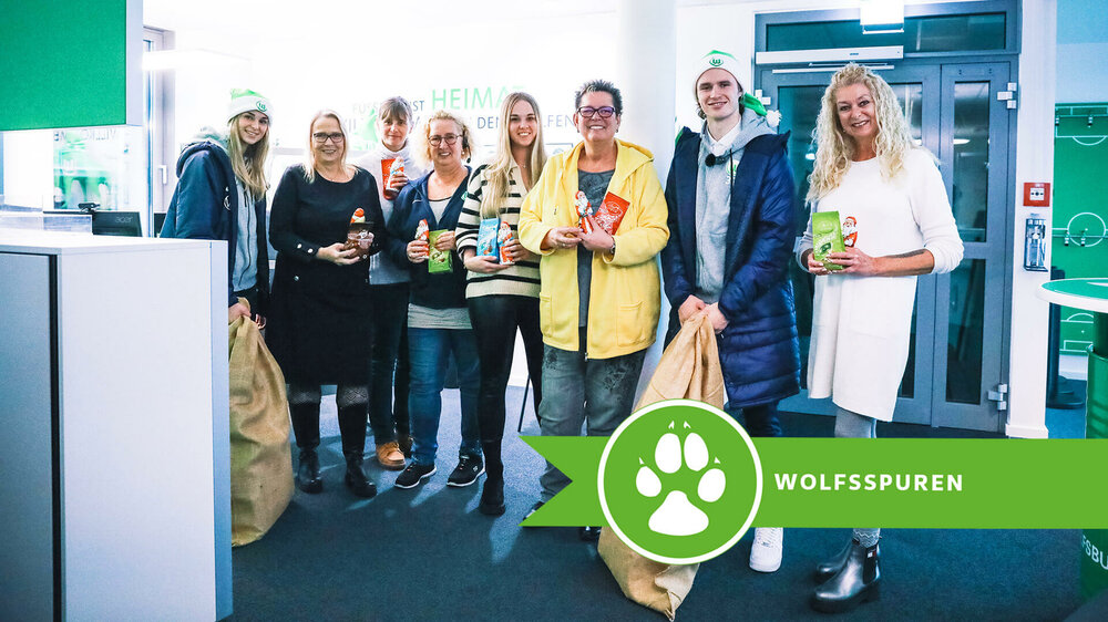 Wolfsspuren mit Spielern des VfL Wolfsburg bei der Nikolausaktion.