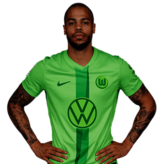 Der VfL Wolfsburg Spieler Lukas Nmecha posiert mit den Händen in der Hüfte.