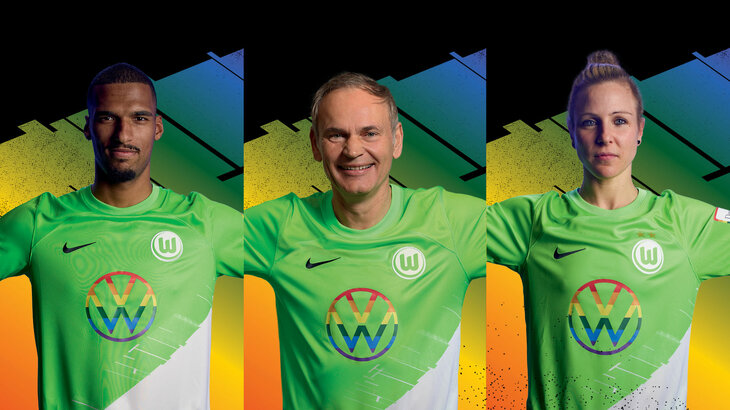 Das Trikot des VfL Wolfsburg zum Vielfaltsspieltag wird von drei Personen gezeigt.