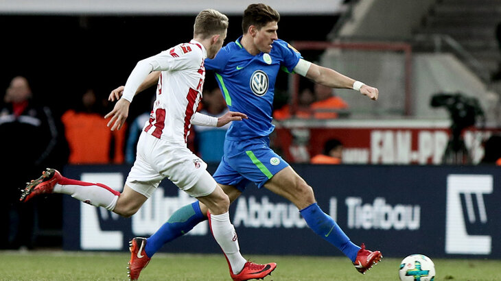 Mario Gomez in a duel during the game. 