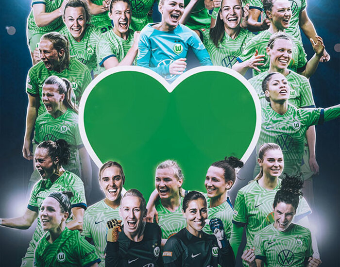 Der gesamte Frauen-Kader des VfL Wolfsburg um ein grünes Herz herum.
