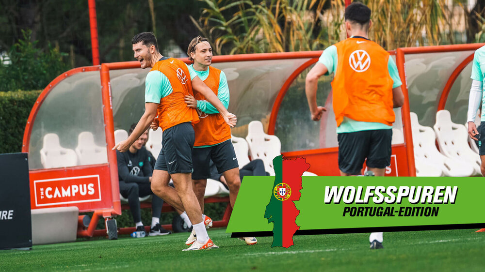 Die VfL-Wolfsburg-Spieler jubeln zusammen.