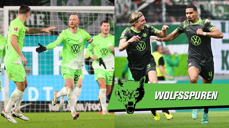 Die Spieler des VfL Wolfsburg bejubeln ihren Treffer. Daneben der Schriftzug Wolfsspuren.