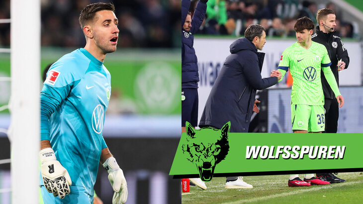 Der VfL-Wolfsburg-Torwart Koen Casteels im Heimspiel zwischen den Pfosten. Auf der rechten Bildhälfte ist der Coach Niko Kovac mit dem Logo der Wolfsspuren zu sehen.