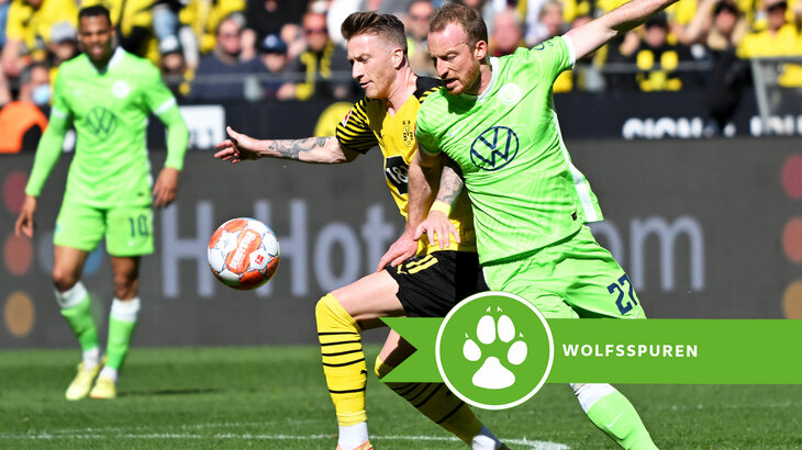 Maximilian Arnold vom VfL Wolfsburg in einem Zweikampf mit einem Gegenspieler von Borussia Dortmund.