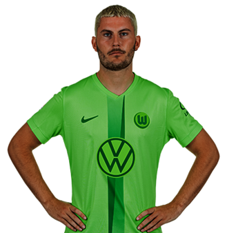 Der VfL Wolfsburg Spieler Jonas Wind posiert mit den Händen in der Hüfte.