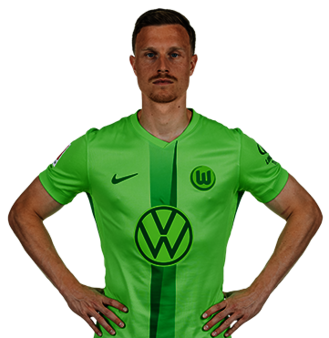 Der VfL Wolfsburg Spieler Yannick Gerhardt posiert mit den Händen in der Hüfte.