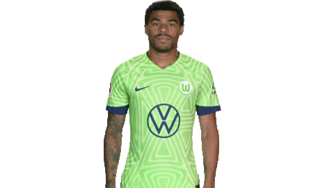 Der VfL Wolfsburg-Spieler Paulo Otavio winkt mit den Händen.